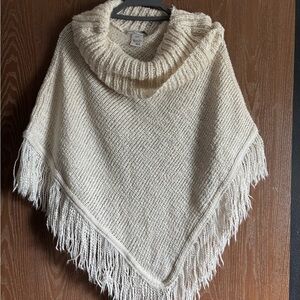 Cozy Cream Knit Poncho with Fringe